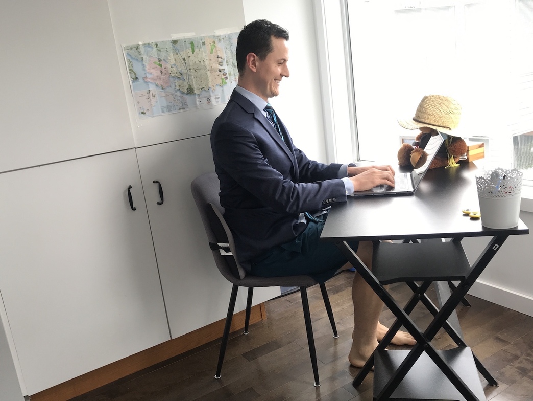 <img src="funny-telehealth-posture.jpg" alt="man on telehealth wearing suit and shorts">